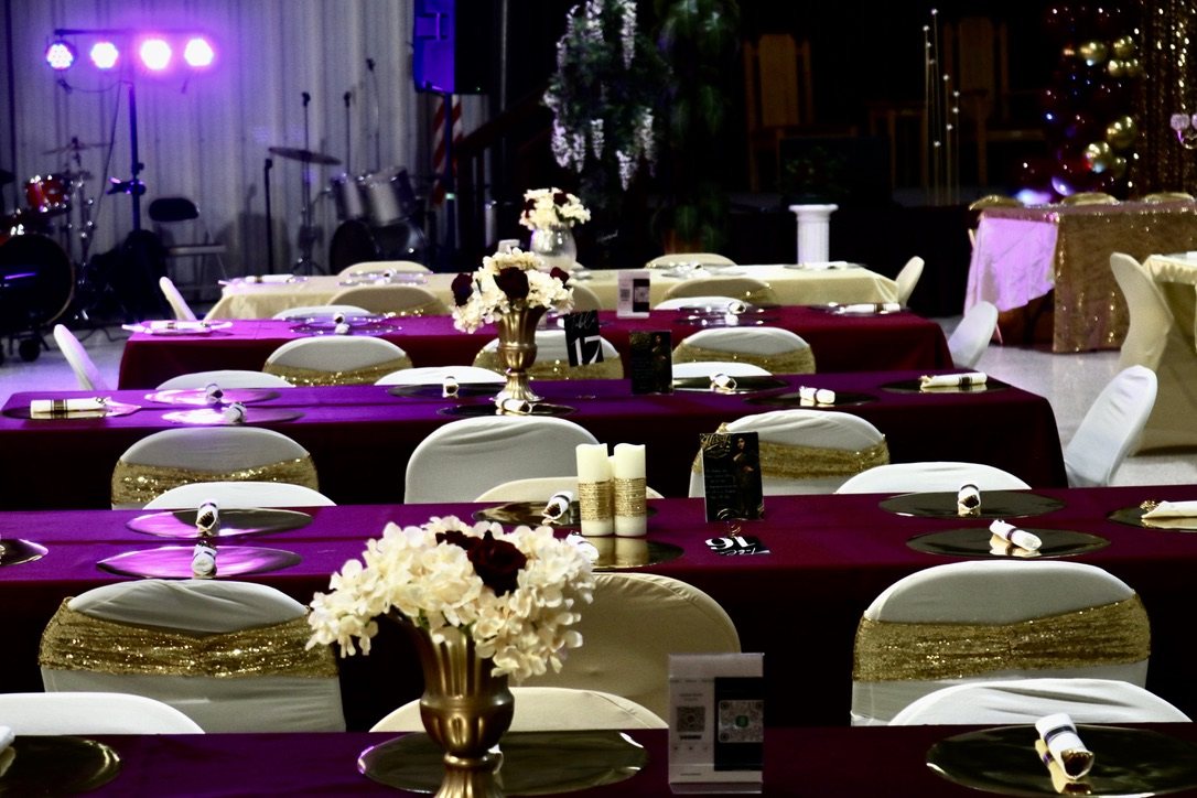 Burgundy and gold banquet setup